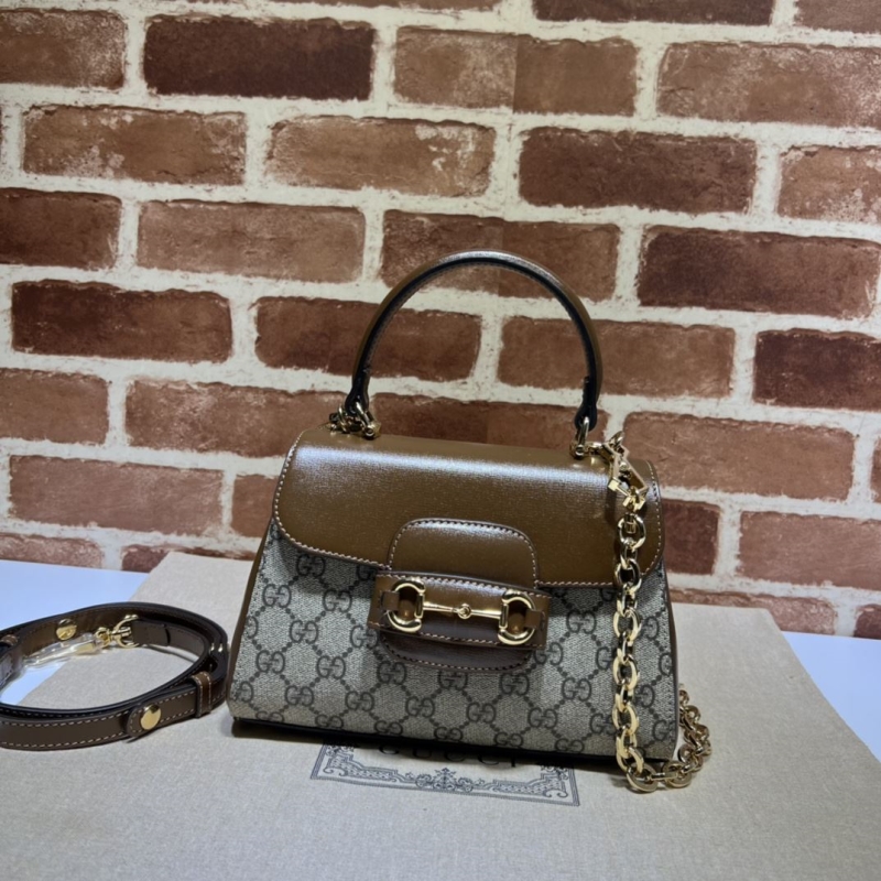 G*u*i top handle bags